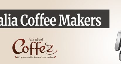 Stainless steel and black drip coffee maker with a glass carafe of brewed coffee on its warming plate