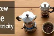 Coffee brewing setup without electricity featuring moka pot, French press, and manual grinder on outdoor table