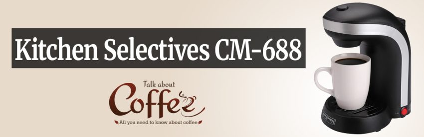 Black Kitchen Selectives CM-688 single serve coffee maker brewing directly into a white mug