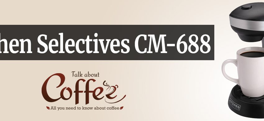 Black Kitchen Selectives CM-688 single serve coffee maker brewing directly into a white mug