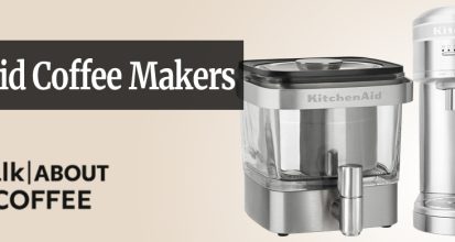 A KitchenAid drip coffee maker in classic Empire Red color on a light wood kitchen counter beside a matching ceramic mug