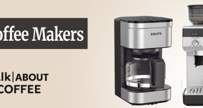 A Krups Espresseria super-automatic espresso machine on a kitchen counter pulling a shot of espresso into a white cup