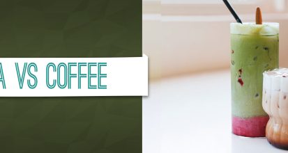 Tall glass of iced matcha latte next to an iced latte on a white table