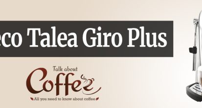 Saeco Talea Giro Plus super-automatic espresso machine in silver, with control knob, steam wand and two glasses of latte macchiato on the drip tray