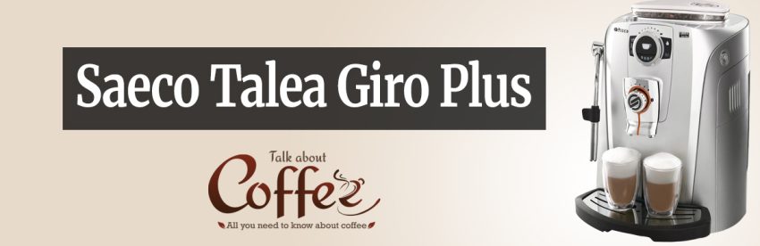 Saeco Talea Giro Plus super-automatic espresso machine in silver, with control knob, steam wand and two glasses of latte macchiato on the drip tray