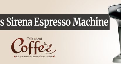 Starbucks Sirena espresso machine in black and brushed silver, with pressure gauge, control buttons and chrome steam wand