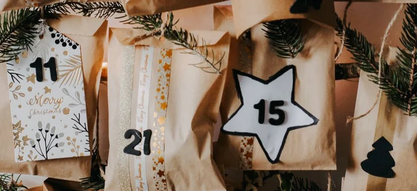 Coffee advent calendar with numbered compartments holding different coffee bean samples